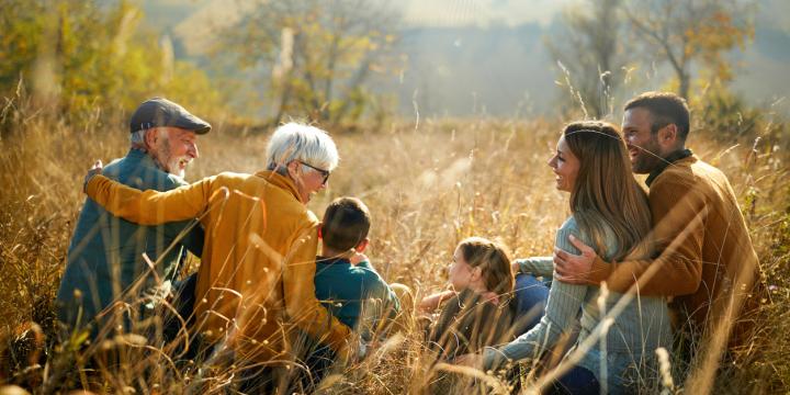 istock-three-generations-in-a-warm-setting