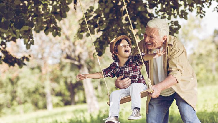 istock-grandfather-child-swing