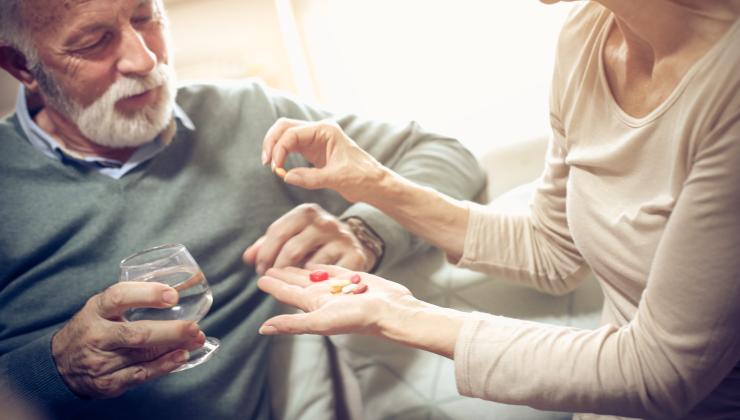 istock-man-taking-a-pill